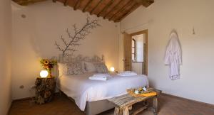 Posteľ alebo postele v izbe v ubytovaní Ca'Novae - Tuscany Farmhouse