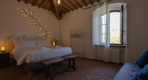 Posteľ alebo postele v izbe v ubytovaní Ca'Novae - Tuscany Farmhouse