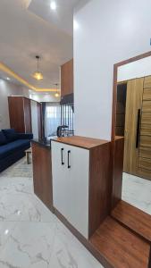 a kitchen with a counter top in a room at Juliana Beach Hurghada in Hurghada