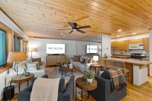 a living room with a couch and a kitchen at Tyrolean 1 Vail Village in Vail
