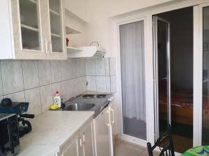 Kuchyňa alebo kuchynka v ubytovaní Judith Apartment
