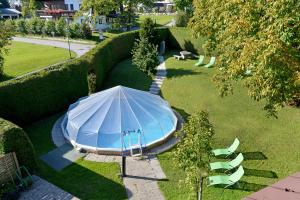 Giardino di Hotel Baumgarten & Chalet Baumgarten