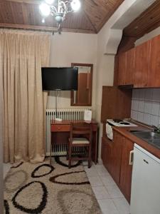 A kitchen or kitchenette at Erodios Guesthouse