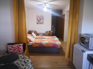 Posteľ alebo postele v izbe v ubytovaní Judith Apartment