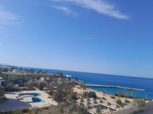 an aerial view of a resort and the ocean at Juliana Beach Hurghada in Hurghada