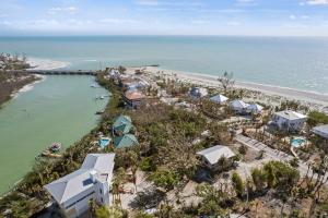 an aerial view of a beach with houses and the ocean at Captiva Beach Bungalow on Turner Beach in Captiva
