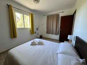 Postel nebo postele na pokoji v ubytování Casa Rural Matilde