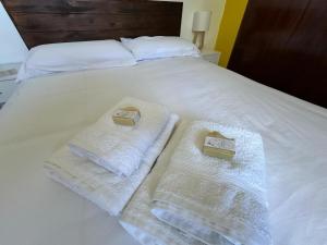 Postel nebo postele na pokoji v ubytování Casa Rural Matilde