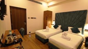 Postel nebo postele na pokoji v ubytování Hotel Elpaso