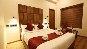 Postel nebo postele na pokoji v ubytování Hotel Elpaso
