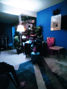 Posezení v ubytování The Teal House