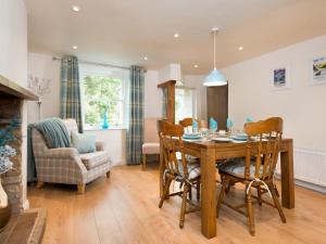 a dining room with a table and chairs at 2 Bed in Yanwath SZ085 in Penrith