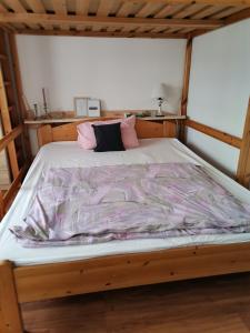 Posteľ alebo postele v izbe v ubytovaní Malomszeg Apartman 3
