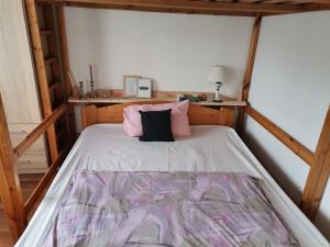 Posteľ alebo postele v izbe v ubytovaní Malomszeg Apartman 3