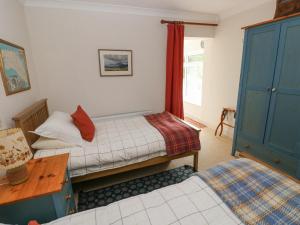 Postel nebo postele na pokoji v ubytování Dolwylan