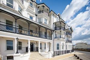 a large white building with a sign on it at Panoramic sea views in beachfront apt w balcony in Bognor Regis
