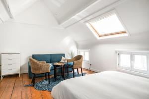 Postel nebo postele na pokoji v ubytování Family Townhouse in the City Centre