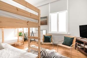 TV a/nebo společenská místnost v ubytování Family Townhouse in the City Centre