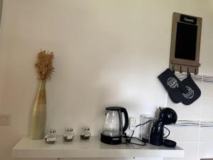 a kitchen counter with a counter top with a blender at Appartement T2, 27 m2, rénové in Carquefou