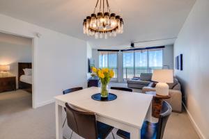 a living room with a table and a couch at Bella Luna, 2 bed and 2 bath beachfront condo in Bradenton Beach