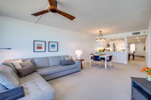 a living room with a couch and a table at Bella Luna, 2 bed and 2 bath beachfront condo in Bradenton Beach