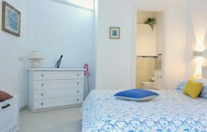 Postel nebo postele na pokoji v ubytování LuSi Capri House