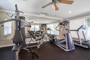 a gym with several treadmills and cardio machines at Fabulous Chic Studio right by LAX w Desk and Wifi in Los Angeles