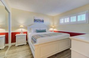 Postel nebo postele na pokoji v ubytování 1003 Ocean Breeze home
