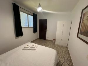 Postel nebo postele na pokoji v ubytování Casa Rural Matilde