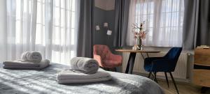 Postel nebo postele na pokoji v ubytování Pension Villa Marit