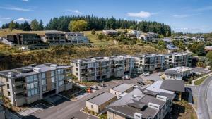 an aerial view of a city with apartment buildings at Lake View Studio Apartment in Wanaka