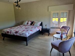 Postel nebo postele na pokoji v ubytování B&B Krieken de Jour