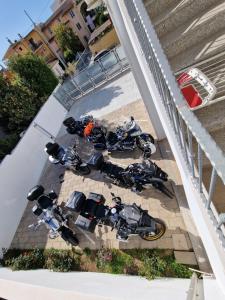 a group of motorcycles parked next to each other at B&B EDEN OGLIASTRA in Tortolì