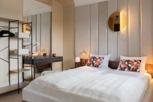 Katil atau katil-katil dalam bilik di Natura Luxury Apartments II
