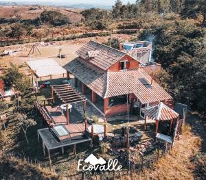 an aerial view of a house with a roof at Ecovalle São Thomé in São Thomé das Letras +18 photos