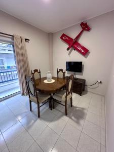 TV a/nebo společenská místnost v ubytování Harmony Central House