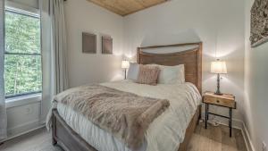 Ένα ή περισσότερα κρεβάτια σε δωμάτιο στο Juniper Ridge