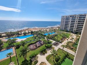 an aerial view of a resort and the ocean at Apartamento Panorama Mar in Punta Prima
