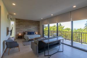 Postel nebo postele na pokoji v ubytování Ocean View Loft in Punta Cocos - C102