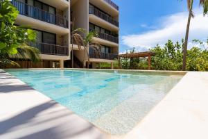Bazén v ubytování Ocean View Loft in Punta Cocos - C102 nebo v jeho okolí