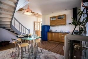 Η κουζίνα ή μικρή κουζίνα στο Résidence Hjem Petite-port Blanc - Maisons & Villas pour 4 Personnes 214