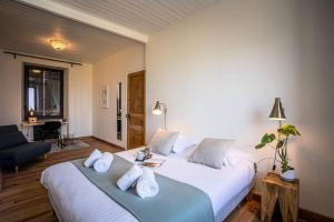 Katil atau katil-katil dalam bilik di Résidence Hjem Petite-port Blanc - Maisons & Villas pour 4 Personnes 214