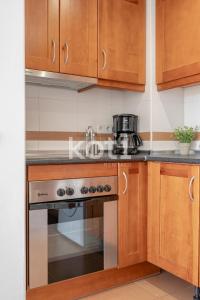 Kuchyň nebo kuchyňský kout v ubytování Koti Rentals - Nenúfar