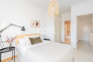 Postel nebo postele na pokoji v ubytování Koti Rentals - Nenúfar