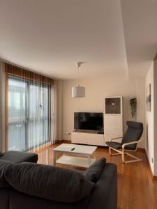A television and/or entertainment centre at Coco Pardal, Pontevedra