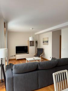 A television and/or entertainment centre at Coco Pardal, Pontevedra
