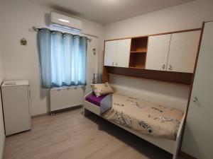 Postel nebo postele na pokoji v ubytování Kuća za odmor EMA