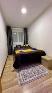Lova arba lovos apgyvendinimo įstaigoje NeriesResort 3 Rooms Suite iN Centrum