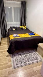 Lova arba lovos apgyvendinimo įstaigoje NeriesResort 3 Rooms Suite iN Centrum