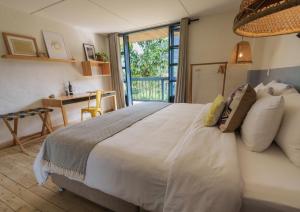 Cama o camas de una habitación en Hotel Plantación